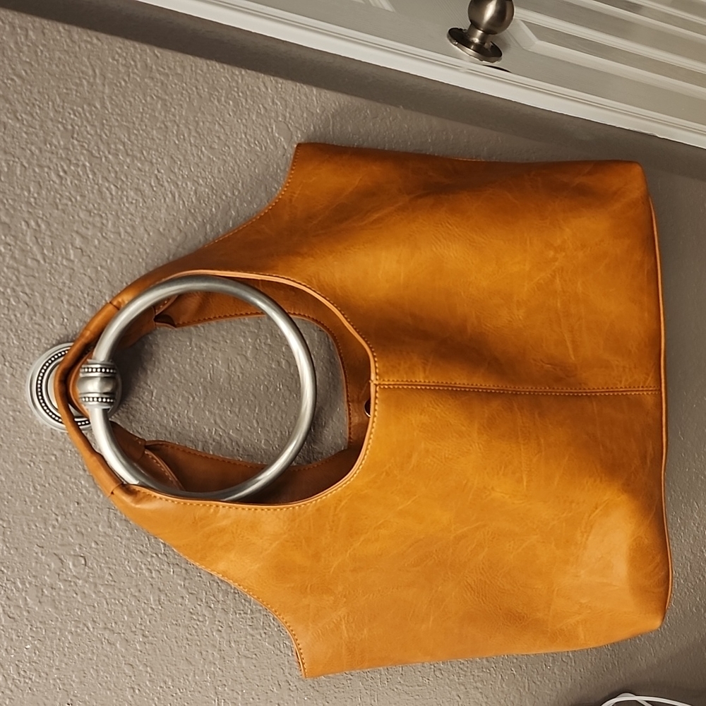 Ah-dorned bag